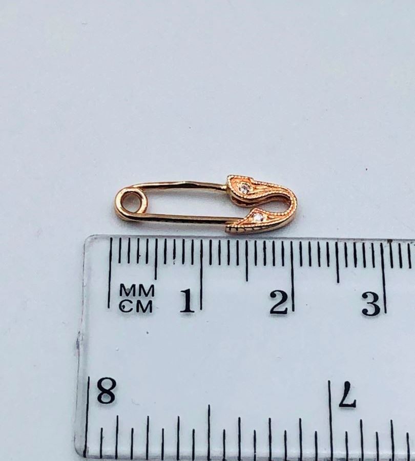 Золотая брошь 585° 0,8 г.